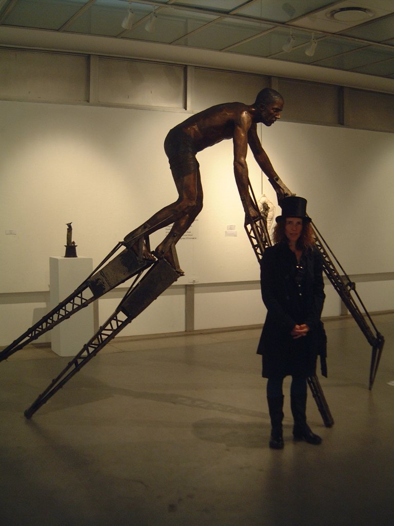 Elizabeth Balcomb standing next to 'Son of Man, 2015' (3)
